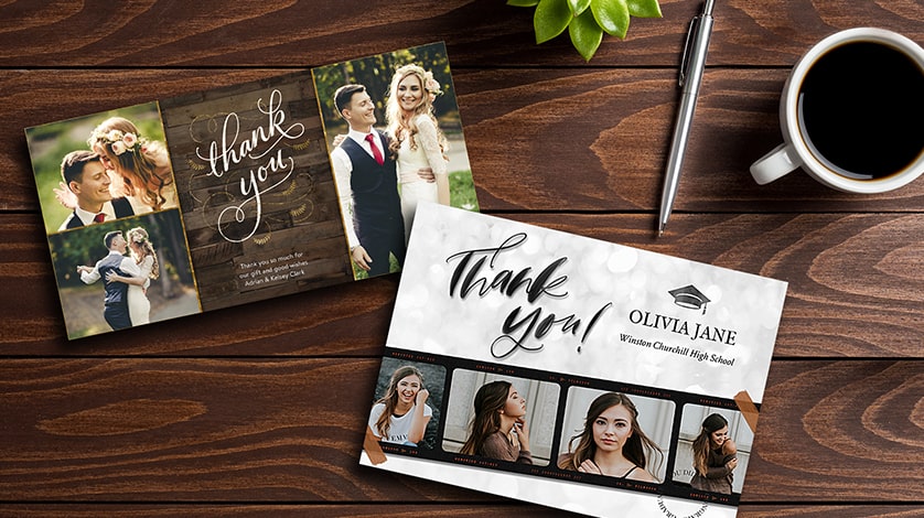 Shop Thank You Cards: A wedding-themed and a graduation-themed thank you card on a desk.