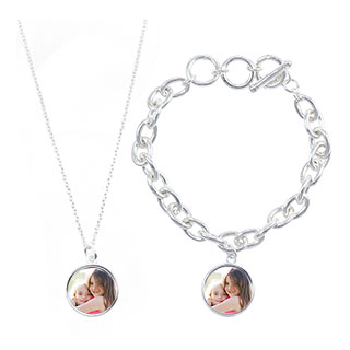 Necklace and Bracelet Set: A matching silver necklace and bracelet set, both with a round photo charm of a mother and daughter.
