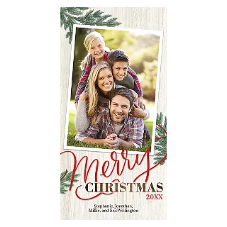 Rustic Merry Card 4x8: A long vertical Christmas card with a wood plank background and pine sprigs, featuring a photo of a family of four piled on top of each other, and the red script text Merry Christmas 20XX with the family's names.