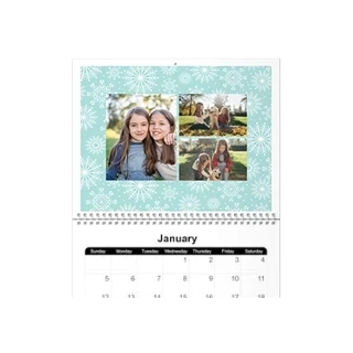 Seasonal Wall calendar design: The top page of a seasonal wall calendar featuring a winter-themed collage of two girls.