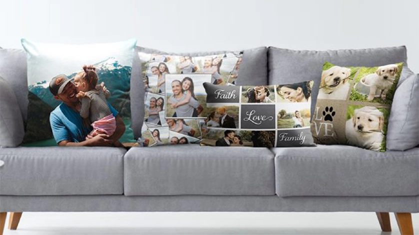 Personalized Pillows: A row of four different personalized photo pillows with various collage and photo designs, sitting on a sofa.