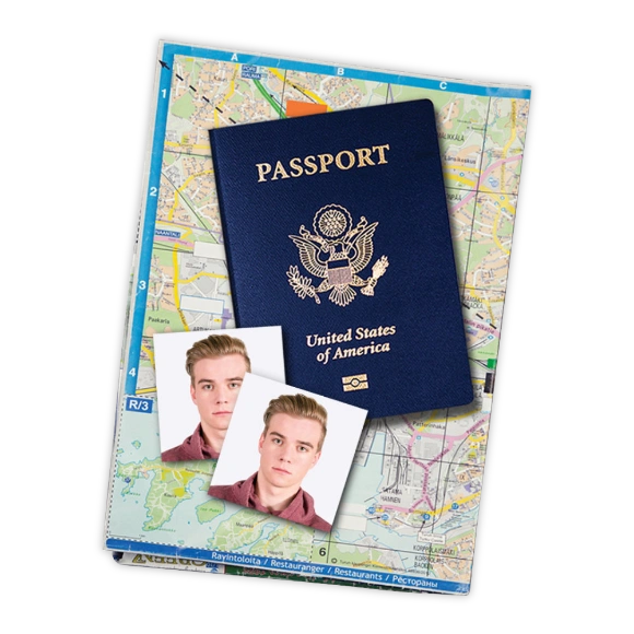 Passport Photos: A United States passport and two passport photos of a young man resting on a folded travel map.
