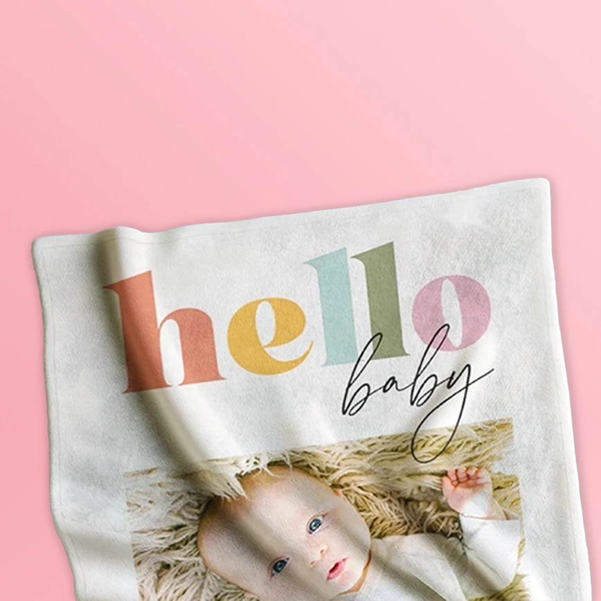 Picture blankets: A personalized baby blanket with a newborn photo and the text hello baby.
