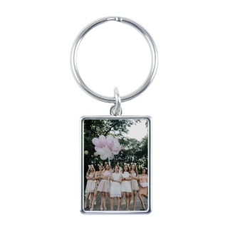 Custom Keychains: A rectangular metal keychain with a photo of a bride and her bridesmaids.