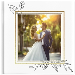 12x12 Wedding Photo Book - Modern Line Wedding Theme: The cover of a square wedding photo book with a gold glitter frame and line-art leaf illustrations.